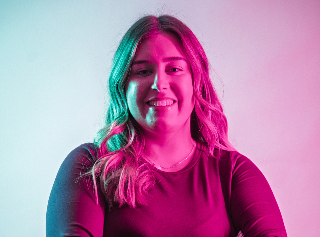 Student smiling at the camera.